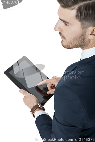 Image of Businessman using a tablet computer