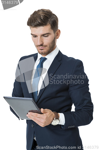 Image of Businessman using a tablet computer