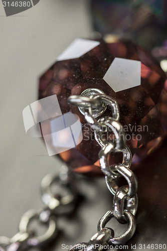 Image of Attractive shiny purple beads on jewellery