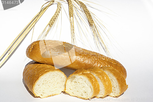 Image of White bread and golden wheat 