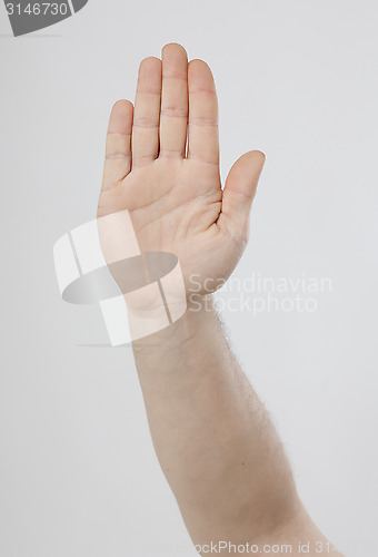 Image of Hand showing stop