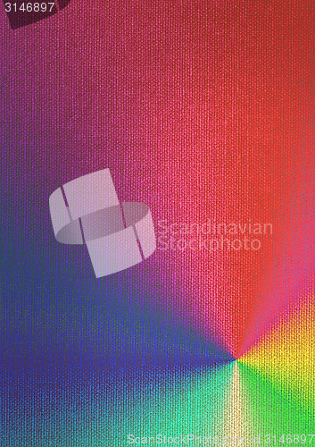 Image of rainbow-colored paints on canvas
