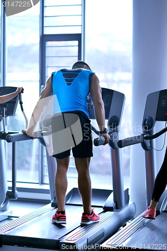 Image of man running on the treadmill