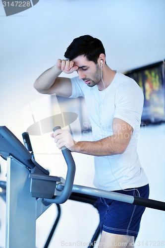 Image of man running on the treadmill