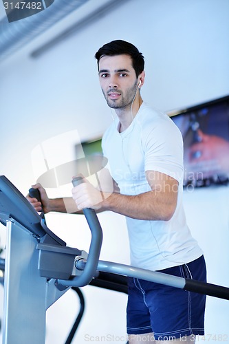Image of man running on the treadmill