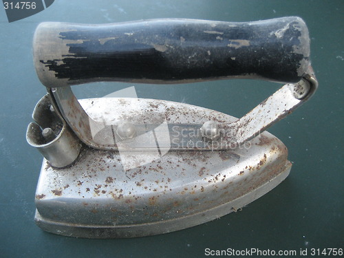 Image of Old electrical flat iron