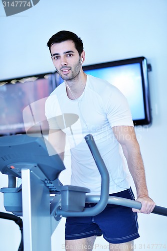 Image of man running on the treadmill