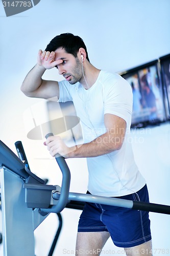 Image of man running on the treadmill