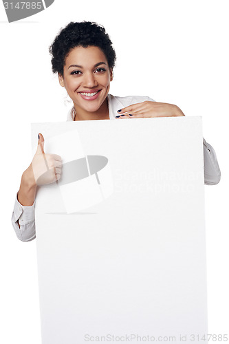 Image of Business woman showing blank credit card