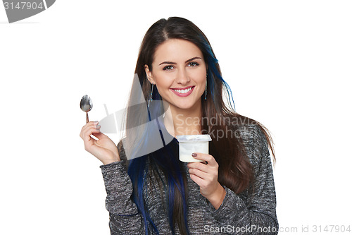 Image of Healthy woman eating yoghurt
