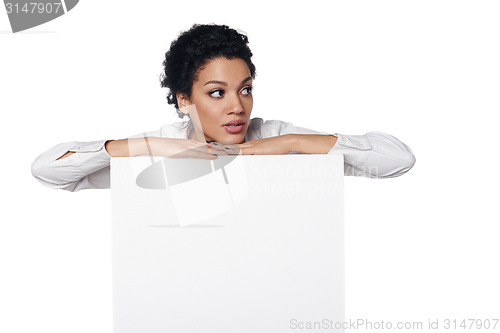 Image of Business woman showing blank credit card