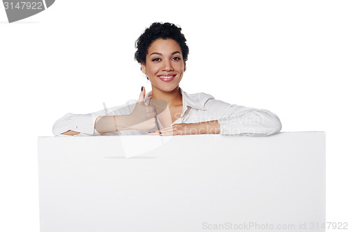 Image of Business woman showing blank credit card