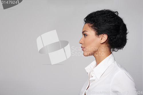 Image of Closeup profile of business woman looking forward