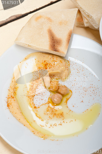 Image of Hummus with pita bread 