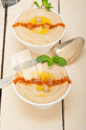 Image of Hummus with mint on top