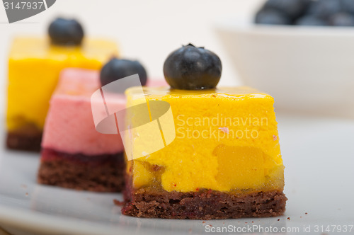 Image of strawberry and mango mousse dessert cake