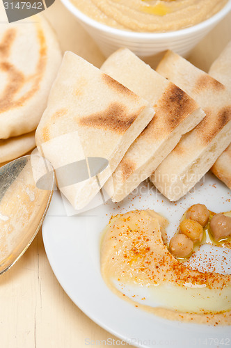 Image of Hummus with pita bread 