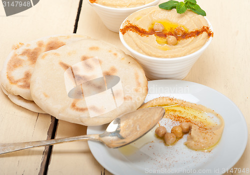 Image of Hummus with pita bread 