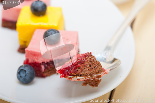 Image of strawberry and mango mousse dessert cake