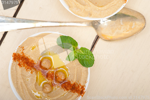 Image of Hummus with mint on top