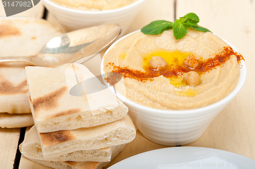 Image of Hummus with pita bread 