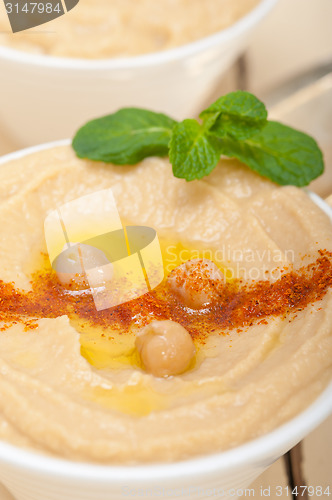 Image of Hummus with mint on top