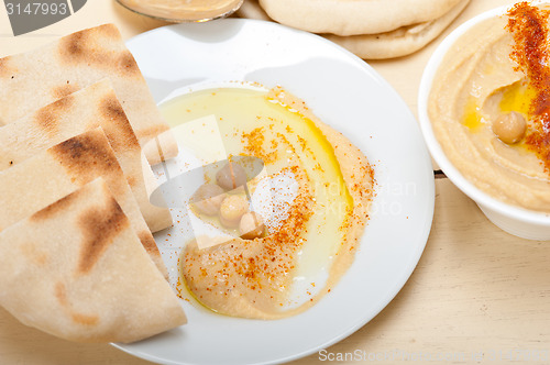 Image of Hummus with pita bread 