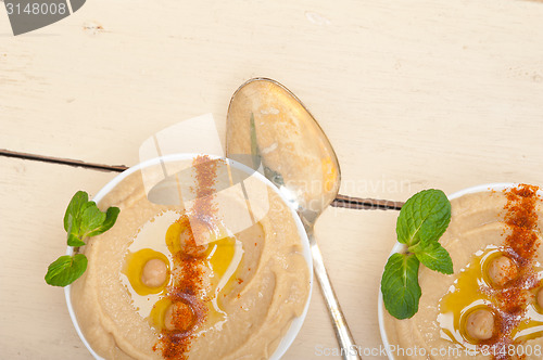 Image of Hummus with mint on top