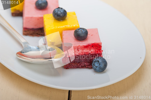 Image of strawberry and mango mousse dessert cake