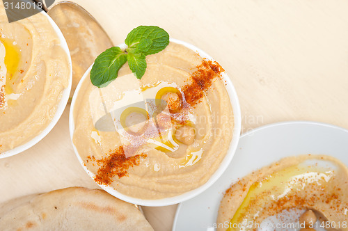 Image of Hummus with pita bread 