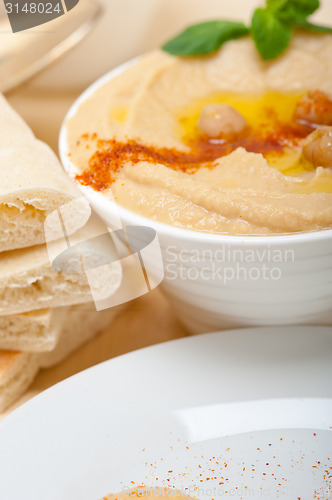 Image of Hummus with pita bread 