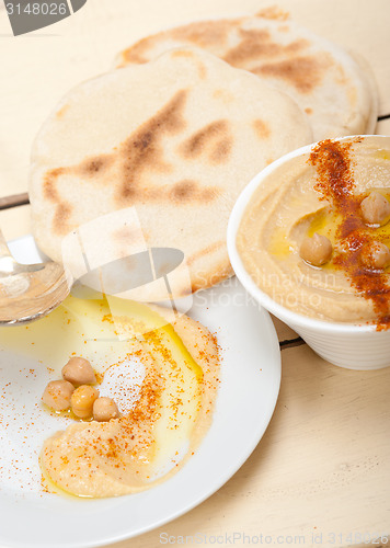 Image of Hummus with pita bread 