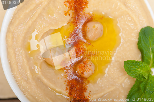 Image of Hummus with mint on top