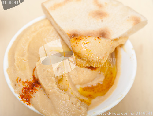 Image of Hummus with pita bread 