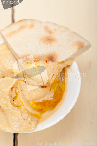 Image of Hummus with pita bread 