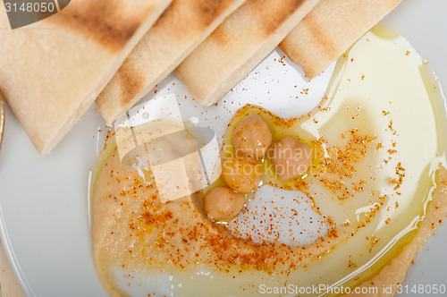 Image of Hummus with pita bread 