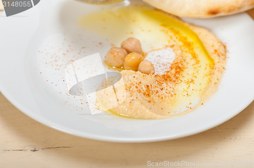 Image of Hummus with pita bread 