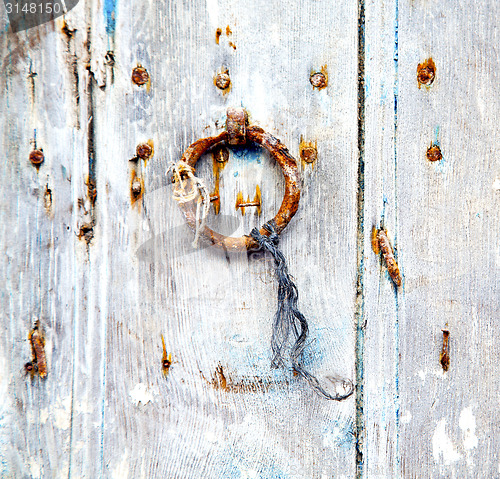 Image of brown  morocco in africa the old wood  facade home and rusty saf