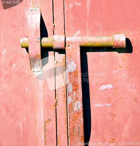 Image of red  metal rusty  brown    morocco in africa  