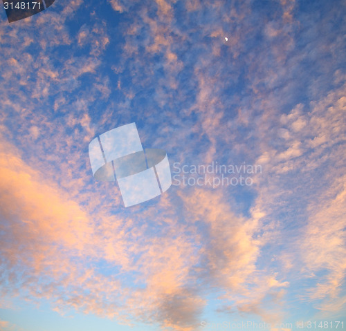 Image of sunrise in the colored sky white soft clouds and abstract backgr