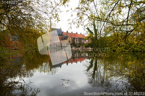 Image of Lake of Love with medieval castle in Bruges, Belgium