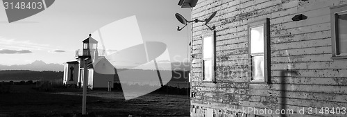 Image of Keepers Quarters Stands Weathered Near Cape Mountain Lighthouse