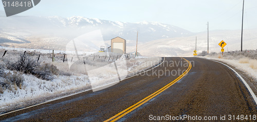 Image of Fresh Snow Blankets Hillside Rural Country Scene Two Lane Road