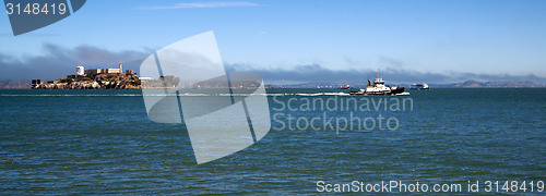 Image of Boats Churn Bay Water Tug Boat Ferry Alcatraz Island San Francis