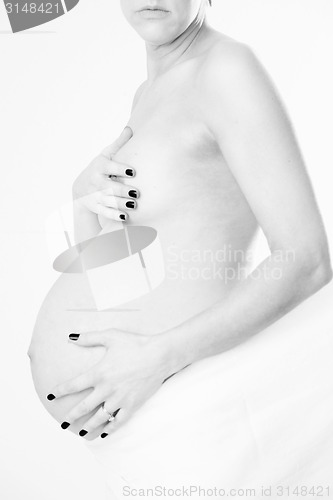 Image of Pregnant Woman Nude Braless Breasts Wearing White Wrap