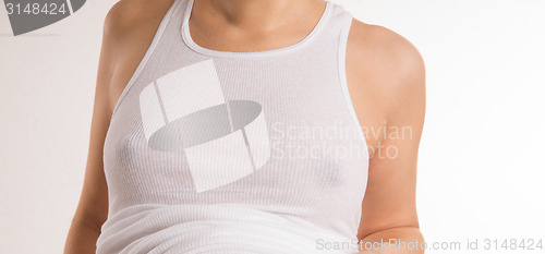 Image of Pregnant Woman Braless Breasts Wearing White Wife Beater Tank To