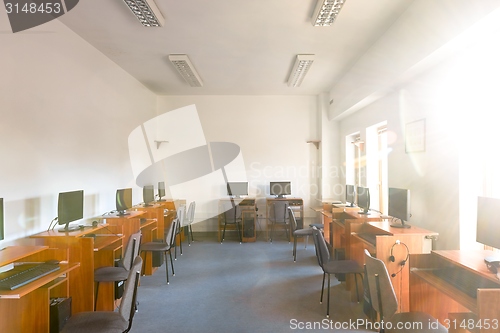 Image of Empty classrom with lot of chairs