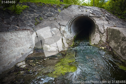 Image of Cooling water flowing into the river