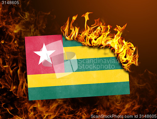 Image of Flag burning - Togo