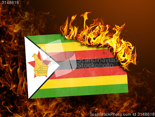 Image of Flag burning - Zimbabwe